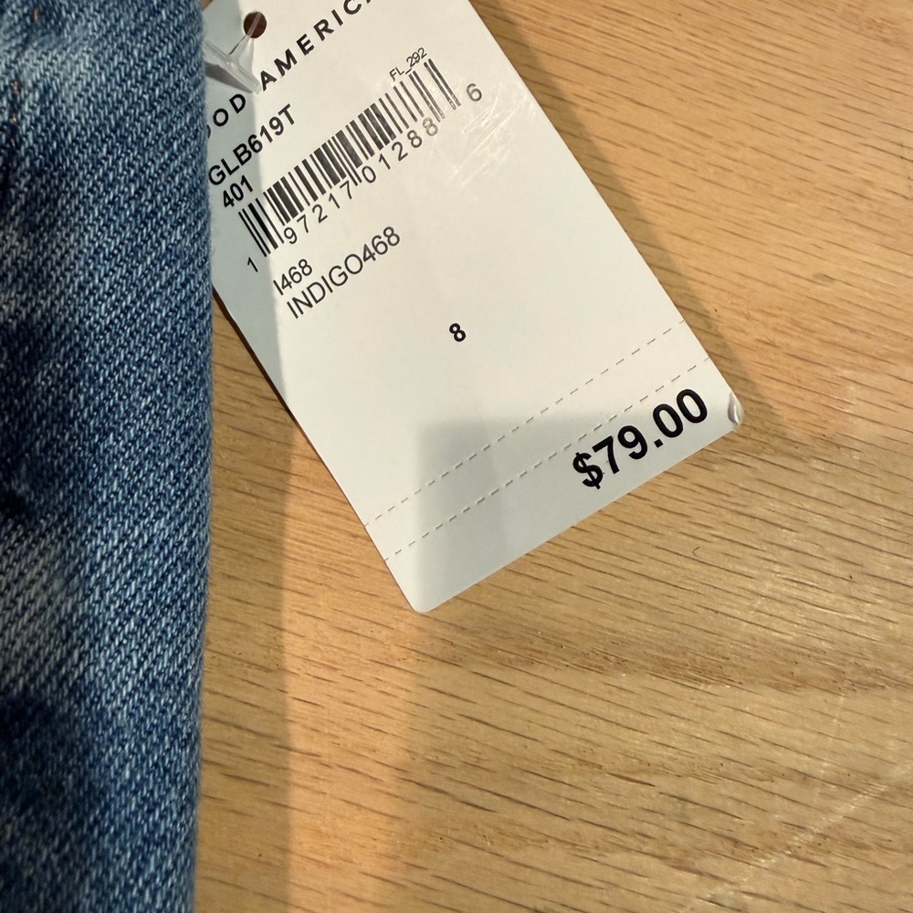 Good American Denim Bermuda Shorts in Medium Blue with Frayed Hem - Picture 4 of 7